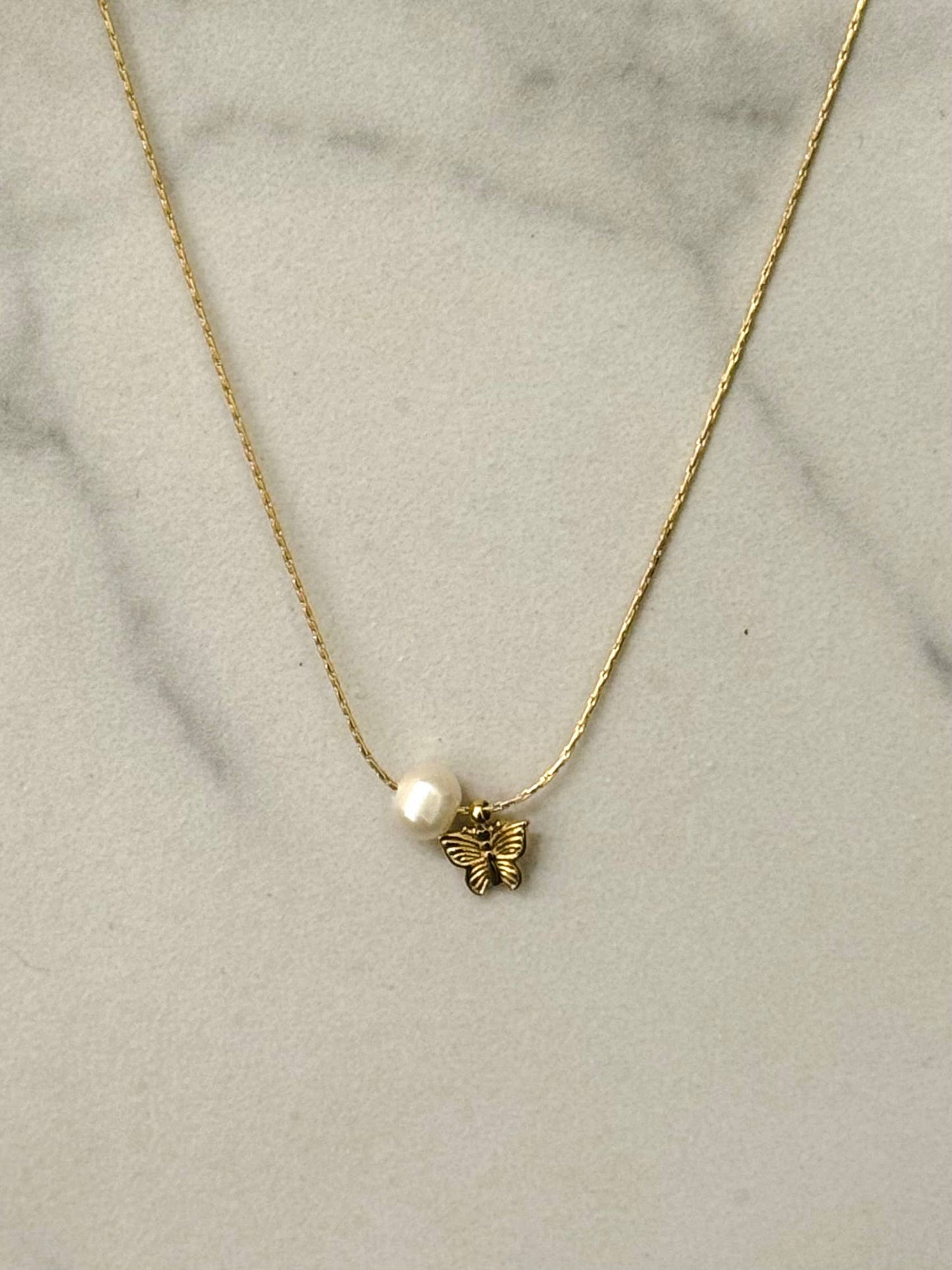 Vlinder Ketting met Parelaccent - Stainless Steel Goud